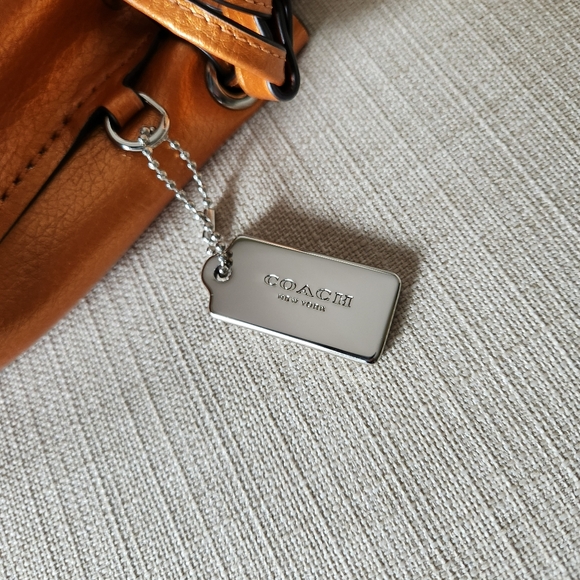 Coach Metallic Orange Leather Drawstring Crossbody - Picture 2 of 15